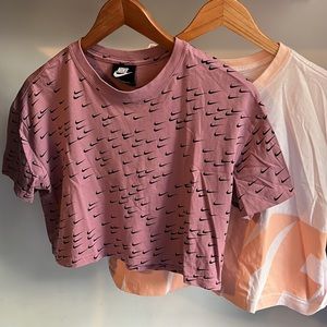 Two Nike crop tops light and dark pink size medium